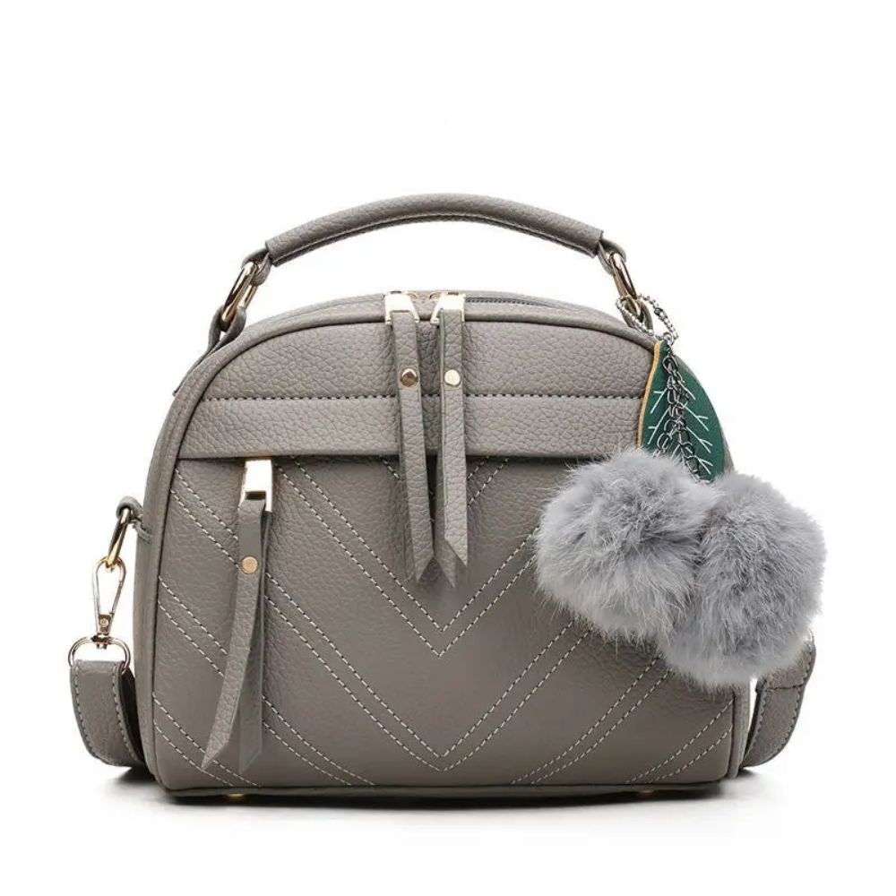 Schultertasche mit Fourrure Boule