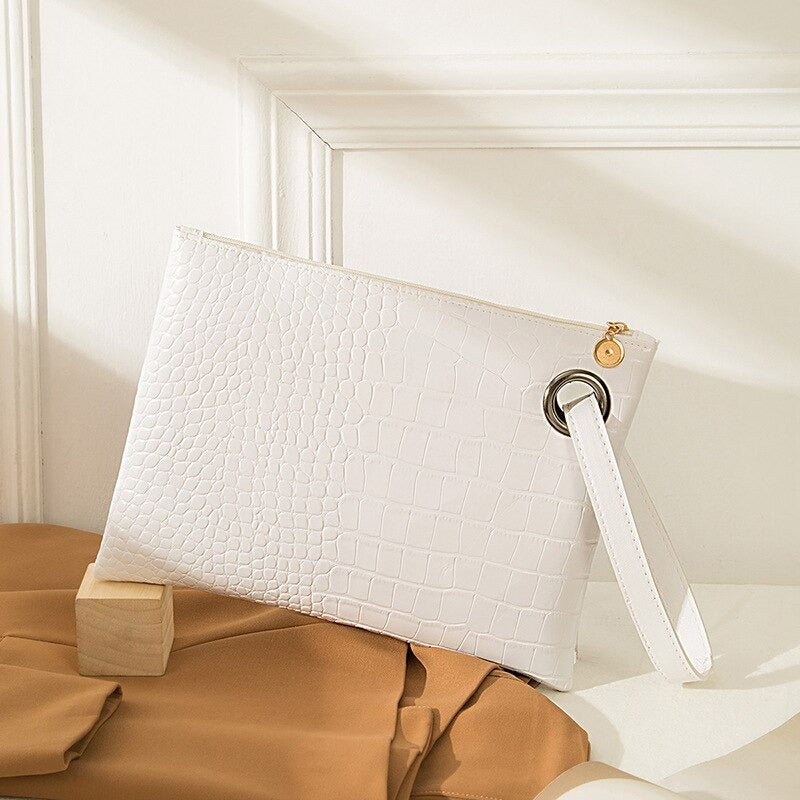 Clutch mit Krokodil-Optik
