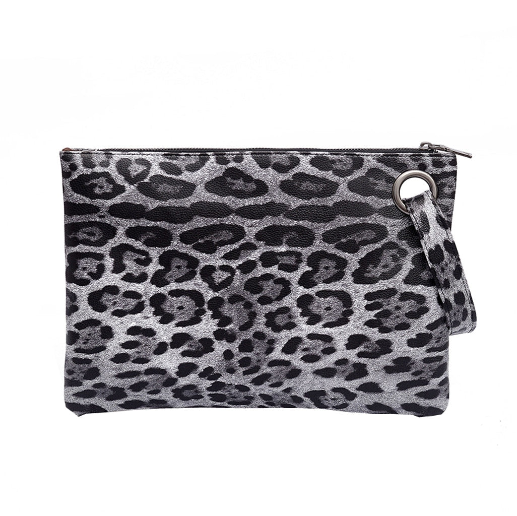 Clutch mit Schlangen-Print
